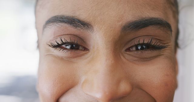 Close-Up of African-American Woman's Eyes Smiling - Download Free Stock Images Pikwizard.com