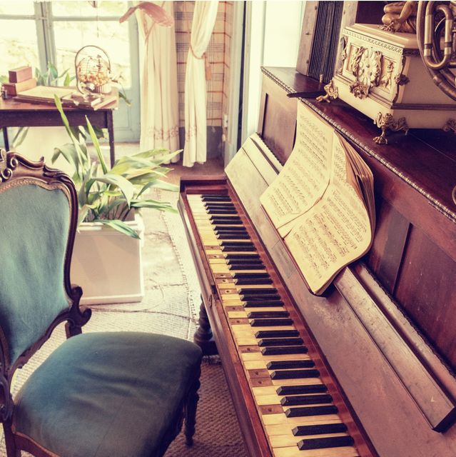 Vintage Music Room with Old Pianoforte and Sheet Music - Download Free Stock Photos Pikwizard.com