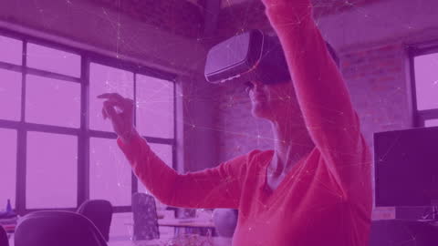 Woman Using VR Technology with Digital Network Overlay