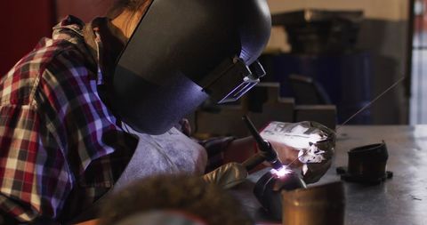 Female Mechanic Welding in Auto Repair Shop - Download Free Stock Images Pikwizard.com