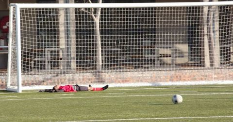Youth Soccer Freeze Frame: Fallen Goalie Strategizing