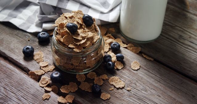 Healthy Breakfast with Bran Flakes and Blueberries on Rustic Table - Download Free Stock Images Pikwizard.com