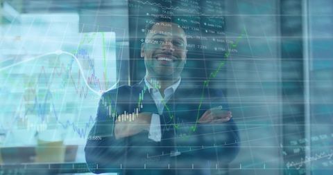 Confident executive standing with arms crossed smiling against rising stock market charts