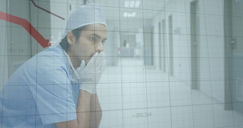 Stressed Doctor Analyzing Declining Medical Data