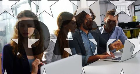 Diverse Team Collaborating in Modern Office During Day