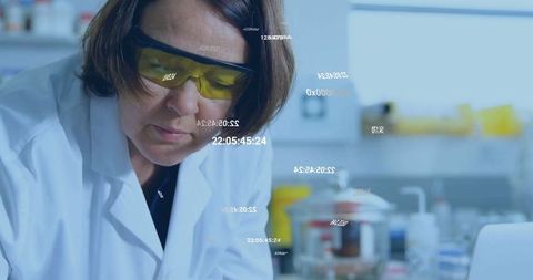 Scientist in Modern Lab Conducting Precise Experimentation