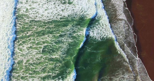 Aerial View of Ocean Waves Crashing on Beach Shore - Download Free Stock Photos Pikwizard.com