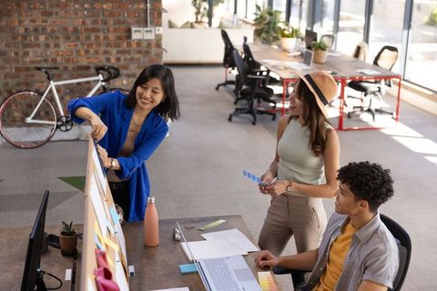 Creative team planning in modern loft workspace