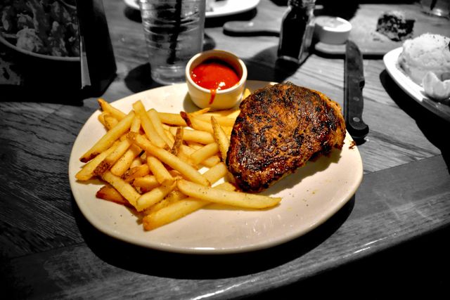 Grilled Chicken with French Fries and Tomato Sauce on Plate - Download Free Stock Photos Pikwizard.com