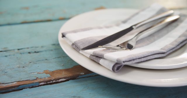 Rustic Dining Setting with Cutlery and White Plate - Download Free Stock Images Pikwizard.com