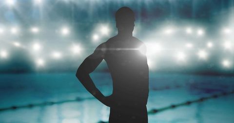 Silhouette of Swimmer Amid Shining Pool Lights and Confetti