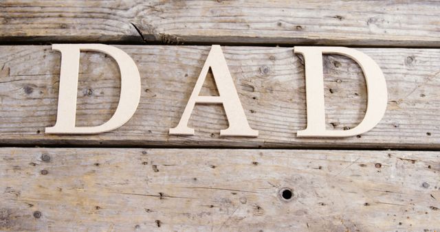 Wooden Letters Spelling DAD on Rustic Wooden Background - Download Free Stock Images Pikwizard.com