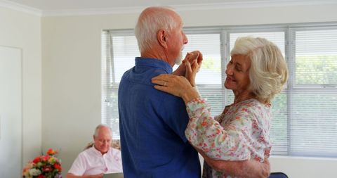 Vivacious Senior Couple Joyfully Dancing in Living Room - Download Free Stock Images Pikwizard.com
