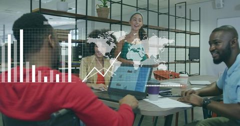 Young Professionals Analyzing Data Visualizations in Modern Office