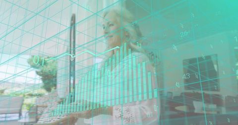 Senior woman analyzing financial growth charts with teal data overlay in patio office