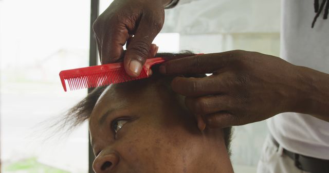 Close-Up of Hairstylist Combing Client’s Hair - Download Free Stock Images Pikwizard.com