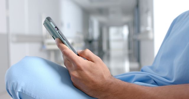 Patient Using Smartphone in Hospital Waiting Room - Download Free Stock Images Pikwizard.com