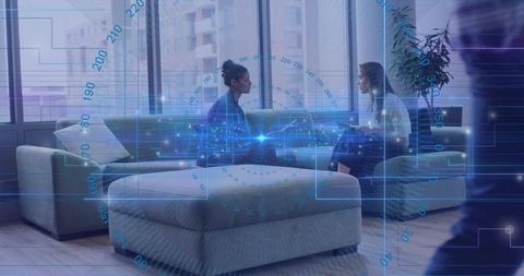 Tech-Integrated Collaboration Meeting in Modern Office Lounge