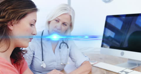 Doctor Comforting Troubled Patient with Futuristic Digital Interface