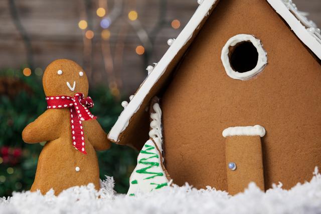 Gingerbread House and Cookie During Christmas Time - Download Free Stock Photos Pikwizard.com