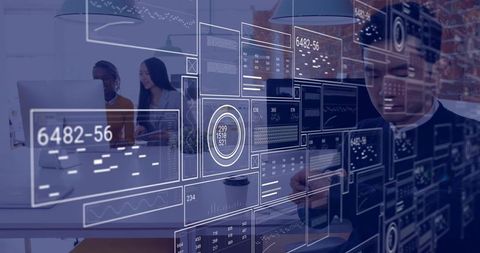 Team interacting with holographic data dashboards and tablet analytics in modern workspace