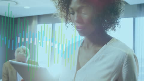 Businesswoman Analyzing Financial Graphs on Digital Tablet