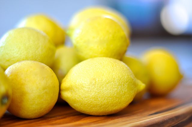 Fresh Juicy Lemons on Wooden Table, Close-Up - Download Free Stock Photos Pikwizard.com