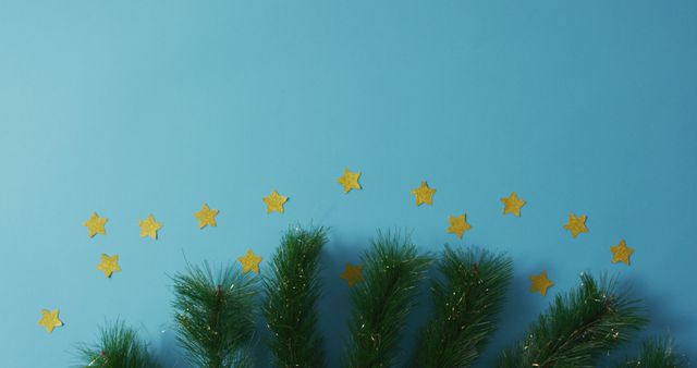 Gold stars scattered on blue background with fir branches along bottom edge, ideal for holiday banners, social media posts, festive invitations, and greeting cards.