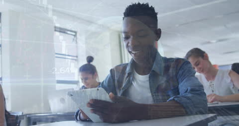 Multiracial Students Using Digital Tablets in Modern Classroom