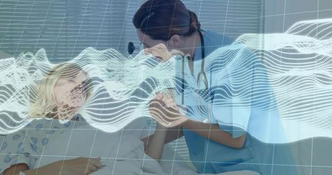 Nurse providing comfort to patient with medical waveform visualization