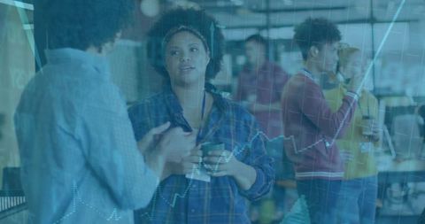 Employees Collaborating in Modern Open Plan Office