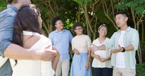 Friends Celebrating and Socializing in Lush Garden