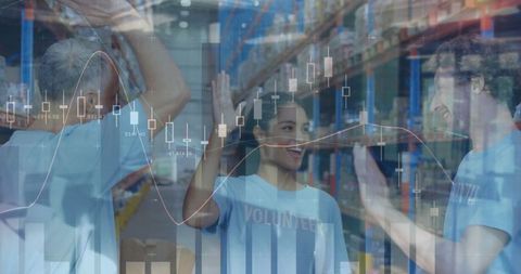 Cheerful Volunteers High Fiving Amidst Digital Financial Data