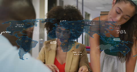 Diverse Business Team Collaborating with Digital World Map Overlay