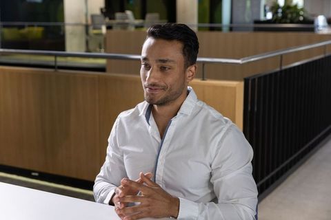 Professional man in modern office atrium