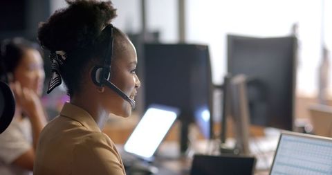 African american businesswoman with headset at work