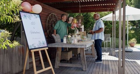Friends Celebrating 60th Birthday at Outdoor Party