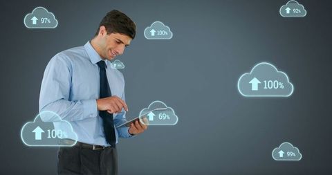 businessman analyzing data on tablet with cloud computing elements - Download Free Stock Images Pikwizard.com