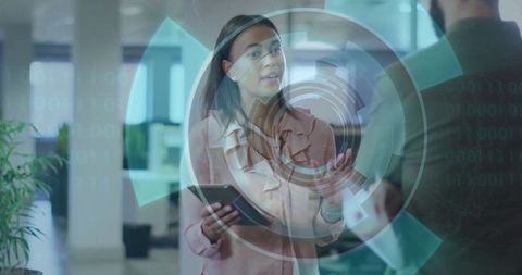 Businesswoman Holding Tablet in Modern Office with Holographic Data Display