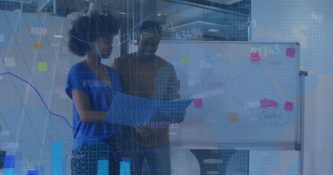 Diverse business team analyzing financial data with modern technology