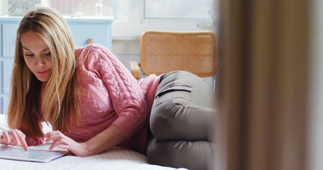 Woman Relaxing on Bed with Tablet at Home - Download Free Stock Images Pikwizard.com