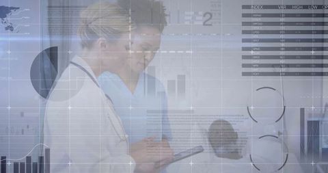 Senior Doctor and Nurse Analyzing Digital Medical Data in Modern Clinic