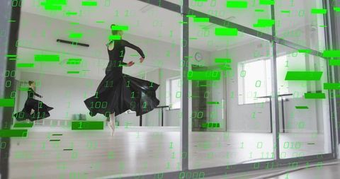 Leaping ballerina en pointe in flowing black dress with green digital code overlay in sunlit studio