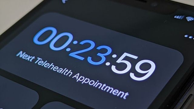 Countdown timer showing telehealth appointment on smartphone screen with status icons