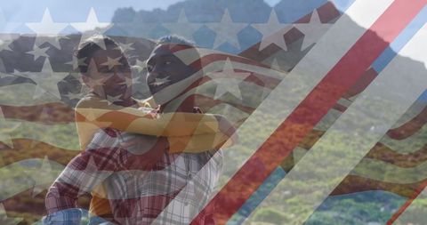 Happy Couple Enjoying Scenic Mountains Beneath American Flag Overlay