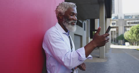 Senior Man Engaging in Video Call Outside