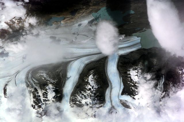 Aerial view of Upsala Glacier in Argentina captured by the International Space Station in December 2000. This image highlights the third largest glacier of the Southern Patagonian Ice Field, with over 800 square kilometers of ice. Perfect for use in environmental studies, climate change presentations, and geographic education.