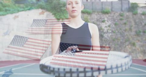 Tennis Player Holding Racket with Blended American Flag Overlay