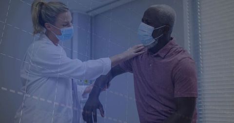 Female Doctor Examining Patient for Shoulder Mobility