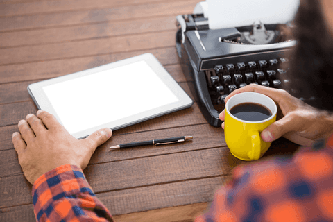 Transparent Tablet with Copy Space and Coffee Next to Vintage Typewriter - Download Free Stock Videos Pikwizard.com